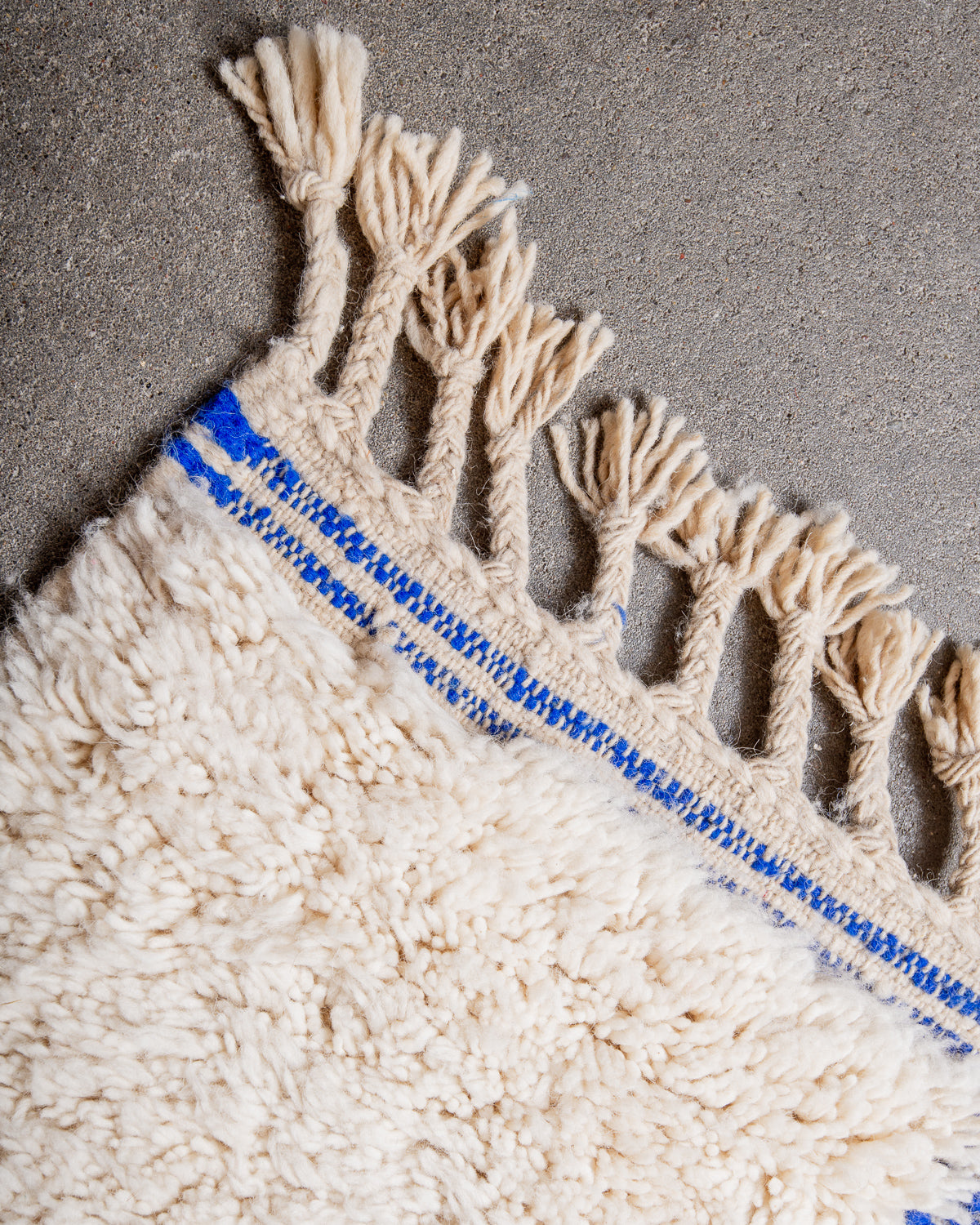 Modern, designer, handcrafted Berber rug from Morocco. Beniourain carpet with beautiful colours and patterns and fluffy wool texture.